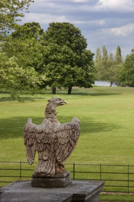 A Child armorial eagle perches on a balustrade on the east front of Osterley. The menagerie was situated over to the left beyond the pond. ©NTPL/Andrew Butler